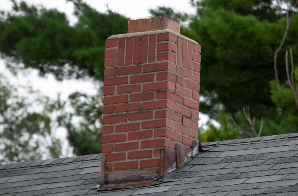 chimney with old roof flashing